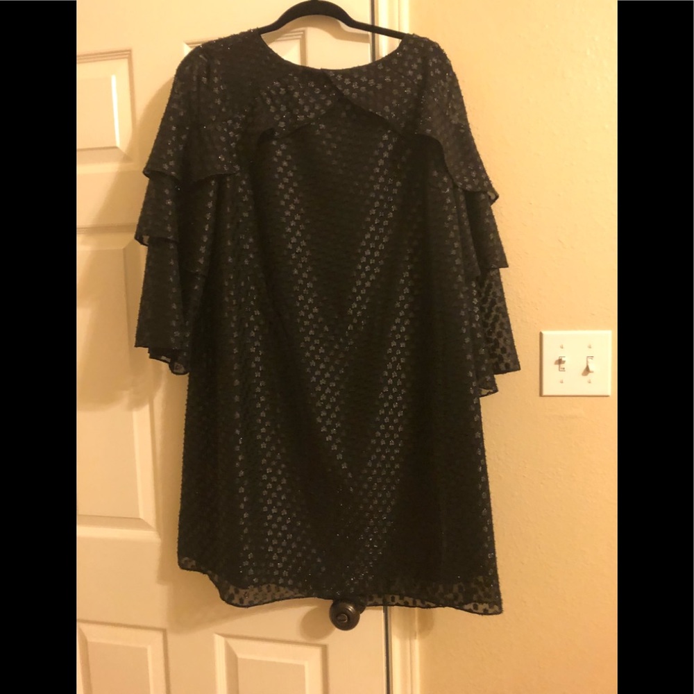 Black and sparkly cocktail dress . Lined. Soft.